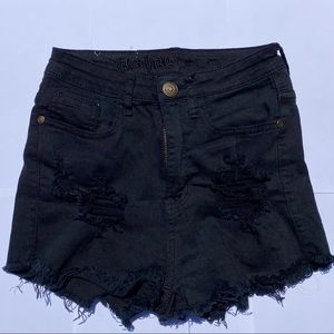 Distressed black jean shorts